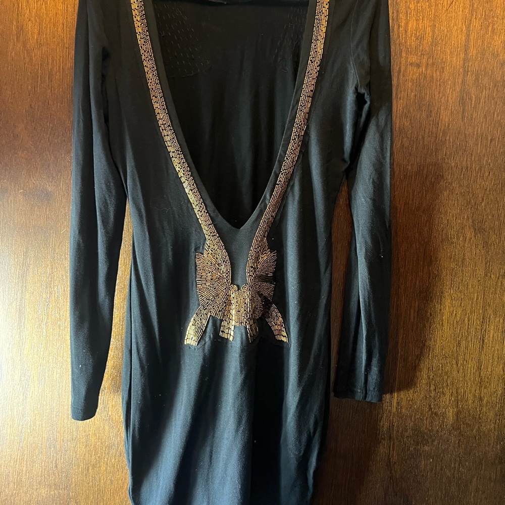 Beaded and backless long sleeve dress